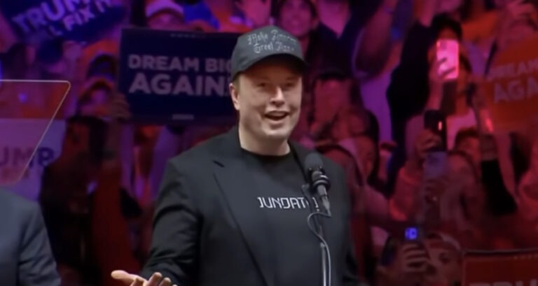 Elon Musk Calls Trump Adviser Peter Navarro ‘Moron’ and ‘Dumber Than a Sack of Bricks’ Over Tariffs